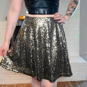 Sequined Mini SkirtBlack and gold sequined skirt by xhilaration